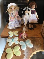 Porcelain dolls with plastic butterfly’s