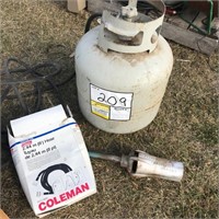 Propane tank, tiger torch and hose adapter