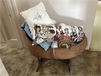 Wicker crib with decorative pillows