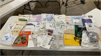 Box of assorted owners manuals