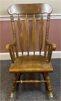 Vintage wooden rocking chair, has a few nicks