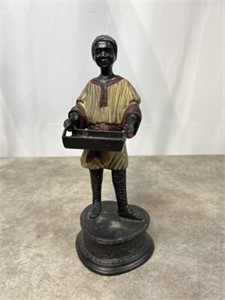 Cold Painted bronze statue of figure holding a