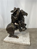 Bronze cowboy sculpture, 12 inches tall