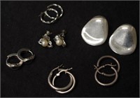Six pairs of sterling silver earrings