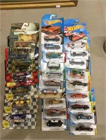 A lot of new Hot Wheels and collector cars