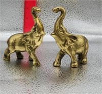 A PAIR OF BRASS ELEPHANTS