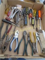 assorted hand tools wrenches screw drivers