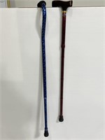 Pair of metal adjustable walking canes