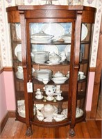 Antique Oak bow front china cabinet with double