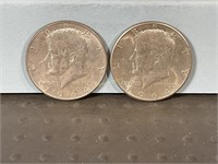 Two 1964 Kennedy half dollars