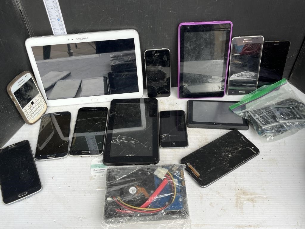 Lot of broken phones, tablets, misc