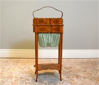 AN ENGLISH ANTIQUE SATINWOOD SEWING STAND