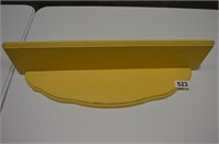 Yellow wall shelf with plate track aprox 18"