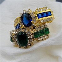 2- RINGS SZ. 6 &  9  BLUE, GREEN & CLEAR STONES