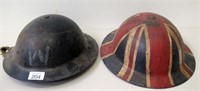 Two WW11 British metal helmets