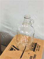 2-boxes of 6- glass jugs w/ handles 1/2 gallon