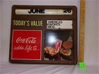 coke calendar sign