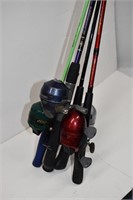 Four Fishing Rods and Reels
