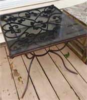 Glass top metal frame patio table