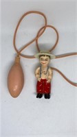 Vintage risqué water squirting gag toy
