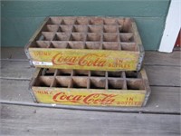 TWO YELLOW COKE CRATES