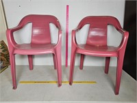 Two like new plastic chairs