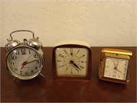 3 asst alarm clocks