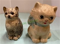 Cast-iron banks - kitty cats. Tallest is 5 inches.