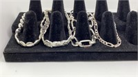 Group of (4) Sterling bracelets all marked,