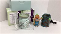 2 untested scentsy wax burners and a scarecrow