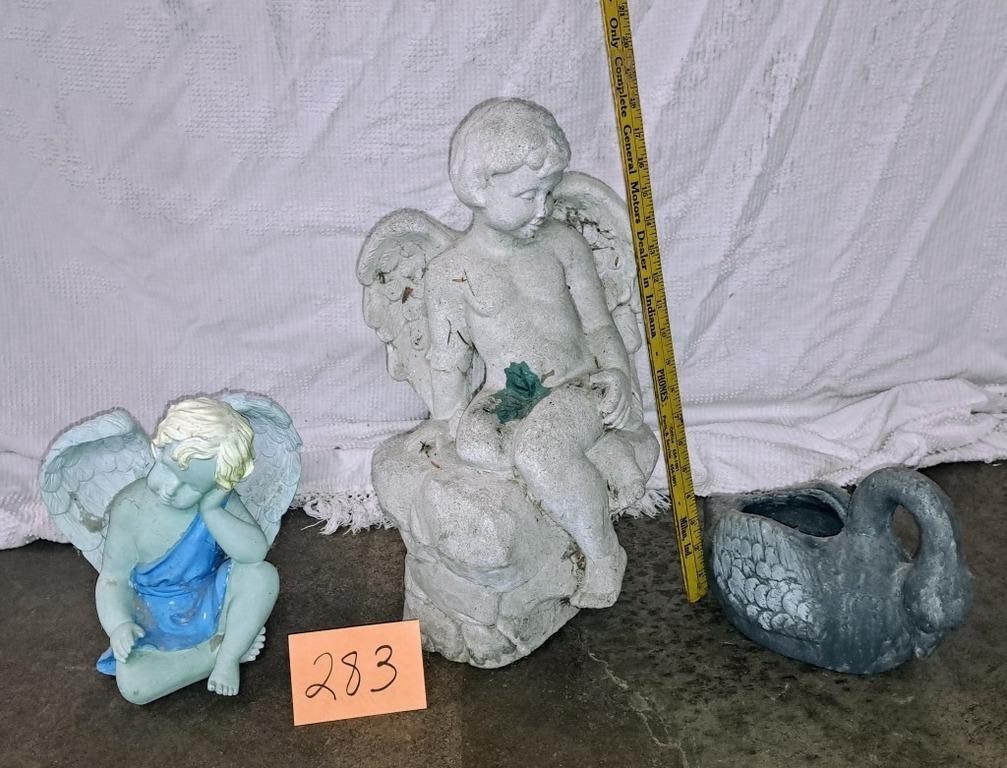 2 cherub statues+duck