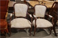 PAIR OF ANTIQUE UPHOLSTERED ARM CHAIRS