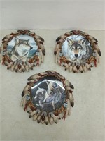 Three wolf plates