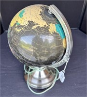 Small lighted globe.