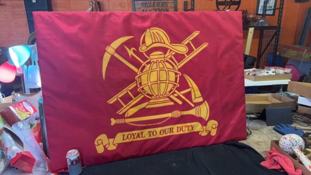 Fire fighters flag mounted on a board