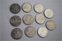 ELEVEN CANADIAN ONE DOLLAR COINS