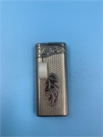 Lighter with pelican, and 2 lions, triple AAA