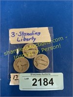 3 standing Liberty quarters