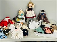 assorted dolls & doll stands