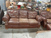 leather living room set has wear but comfy