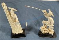 Carved ivory figures approximately 6 inches tall