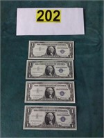 Four 1957 one Dollar Silver Certificates