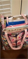 Floral bag full of card stock, file folders