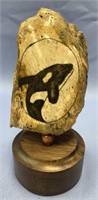 Fossilized scrimshaw of an orca by Michael Scott o