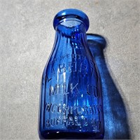Blue milk bottle
