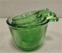 4 Green glass measuring cups