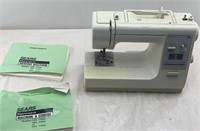 SEARS SEWING MACHINE WITH INSTRUCTIONS