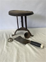 Vintage milk stool, oil can, and funnel