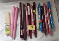 Large lot of taper candles all different colors