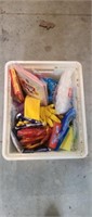 Plastic storage crate with assorted cleaning